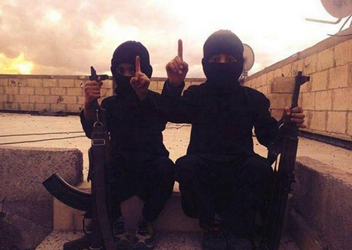 An image posted on 21 October by an Isis-linked Twitter feed, with a caption in Arabic calling these children new graduates of Jihad School