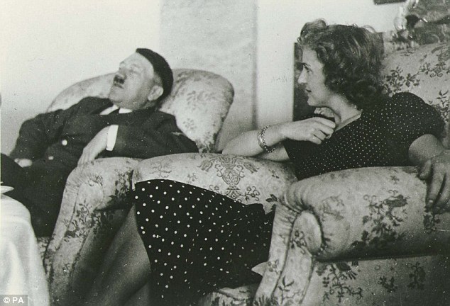 Hitler asleep in an armchair next to Eva Braun in the teahouse on the Eagles Nest in Berchtesgaden