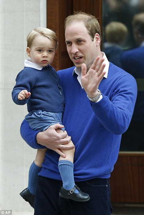 The young royal offers a shy wave to the waiting photographers