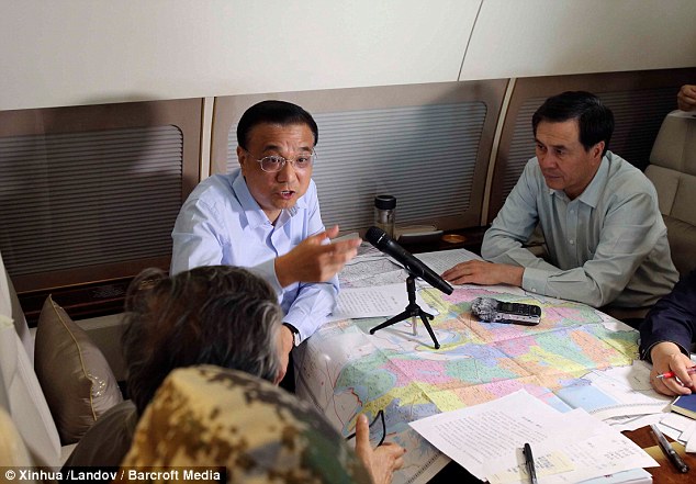 Chinese Premier Li Keqiang chairs a meeting in Beijing to direct the search and rescue operations
