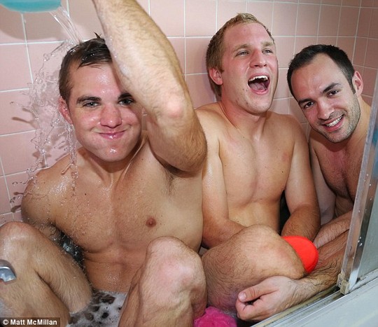 All grown up: The MacMillan brothers recreated old photographs to surprise their mom - including this snap of the three in the bath