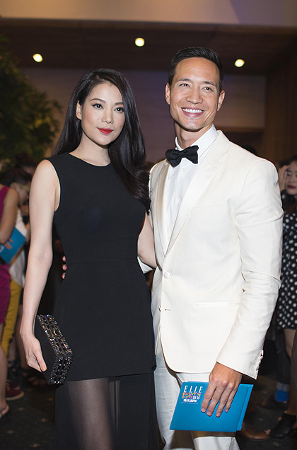 Trương Ngọc Ánh và Kim Lý tay trong tay tham dự sự kiện thời trang Elle Fashion Show 2014. Ảnh: Vietnamnet