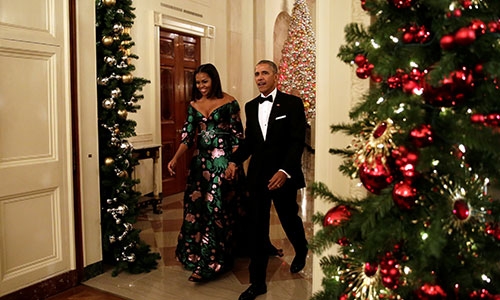 
Vợ chồng ông Obama tại buổi tiệc ở Nhà Trắng tối 4/12. Ảnh: AP
