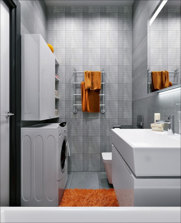 
Bức tường bồn tắm sử dụng các ô hình chữ nhật nhỏ giống như 1 phiên bản khác của tường phòng khách.
