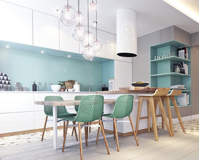 
Góc bếp được thổi sức sống nhờ tường bếp màu xanh bạc hà và những chiếc ghế màu xanh lá nhẹ.

