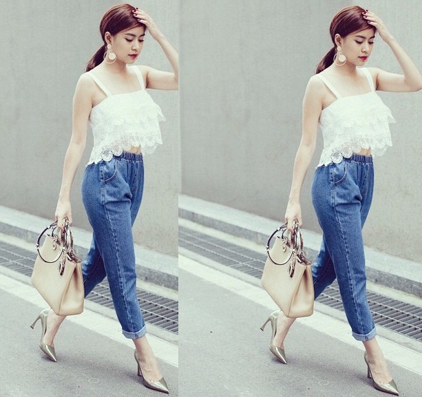 Hoàng Thùy Linh phối áo crop top hai dây với quần jean baggy, set đồ luôn hot trong mùa hè.