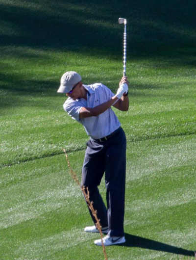 
Ông Obama trên sân golf. Ảnh: Splash News
