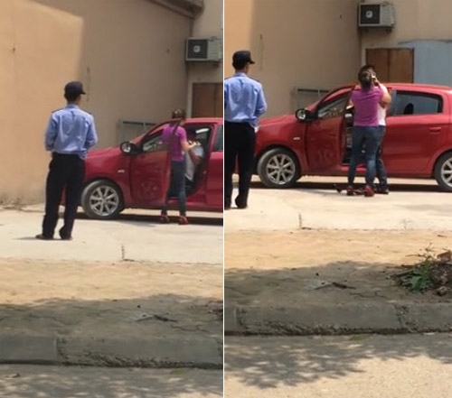 Người vợ lôi chồng ra khỏi xe và liên tiếp tát vào mặt.