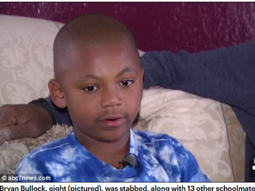 Cậu bé Bryan Bullock, 8 tuổi, phải đi xét nghiệm HIV và viêm gan sau khi bị bạn đâm kim nhọn vào người - Ảnh chụp màn hình Daily Mail