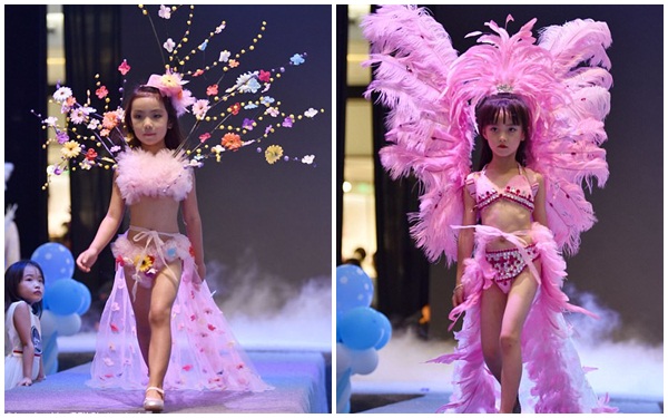 
Những bé gái sải bước trên sàn diễn với trang phục không phù hợp với lứa tuổi của các em.
