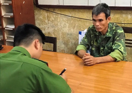Hoàng Văn Vụ khai báo tại cơ quan công an. Ảnh: Công an cung cấp.
