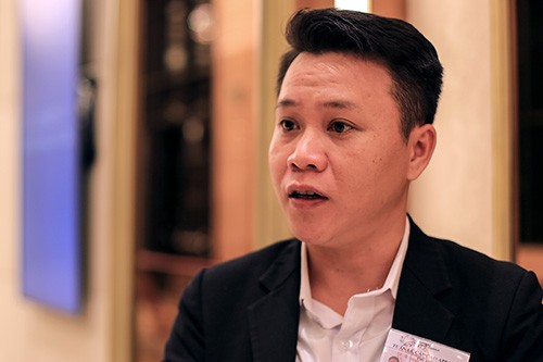 Nguyễn Bảo Vĩnh, điều phối viên quốc yến, cảm thấy tự hào khi được đại diện cho người Việt Nam phục vụ lãnh đạo APEC. Ảnh: Nguyễn Đông.