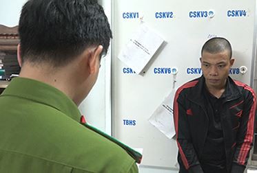 Phúc cái bang tại cơ quan điều tra. Ảnh: Lê Thanh
