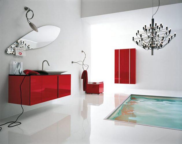 6. Màu đỏ và trắng được tận dụng tối đa trong thiết kế phòng tắm này. Đây là 2 gam màu đem lại hiệu ứng cảm xúc rất tốt. Nếu như màu đỏ đem lại sự quyến rũ, nóng bỏng thì sắc trắng lại đem lại sự tinh khôi, trong trẻo. Chiếc bồn tắm được thiết kế như một bể bơi nhỏ trong nhà đem lại không gian phòng tắm thật sang trọng, hiện đại.