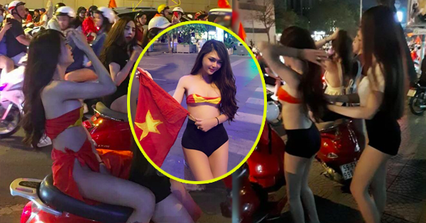 
Hình ảnh cô gái trẻ lột đồ, quấn Quốc kỳ lên người ăn mừng U23 Việt Nam chiến thắng (ảnh tư liệu)
