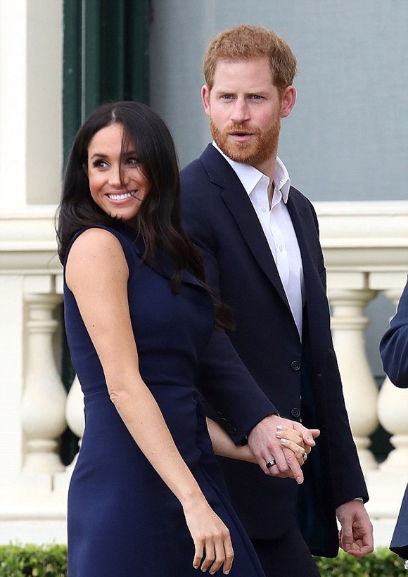 Hoàng tử Harry và vợ bầu Meghan tại sự kiện ở Melbourne sáng 18/10. Ảnh: WireImage.