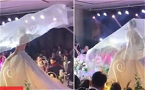 Chiếc khăn voan biết bay là trào lưu mới nổi trong các đám cưới ở Trung Quốc. Ảnh: Xuehua.