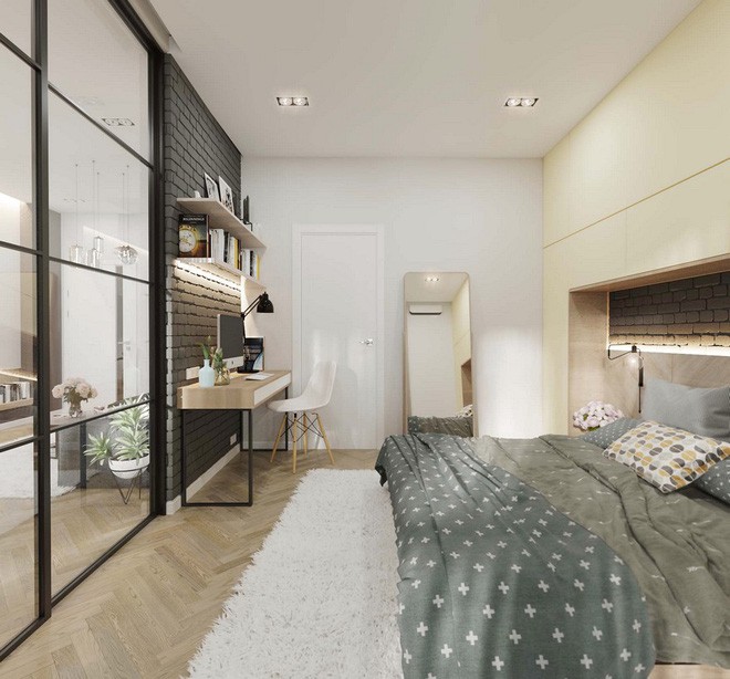 Bàn làm việc được đặt gọn bên trong phòng ngủ với những chiếc kệ mở tiết kiệm diện tích những lại rất hữu dụng.