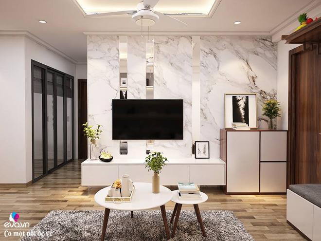 Ở phòng khách, điểm tường xấu xí đã được sử dụng giải pháp là kệ trang trí.