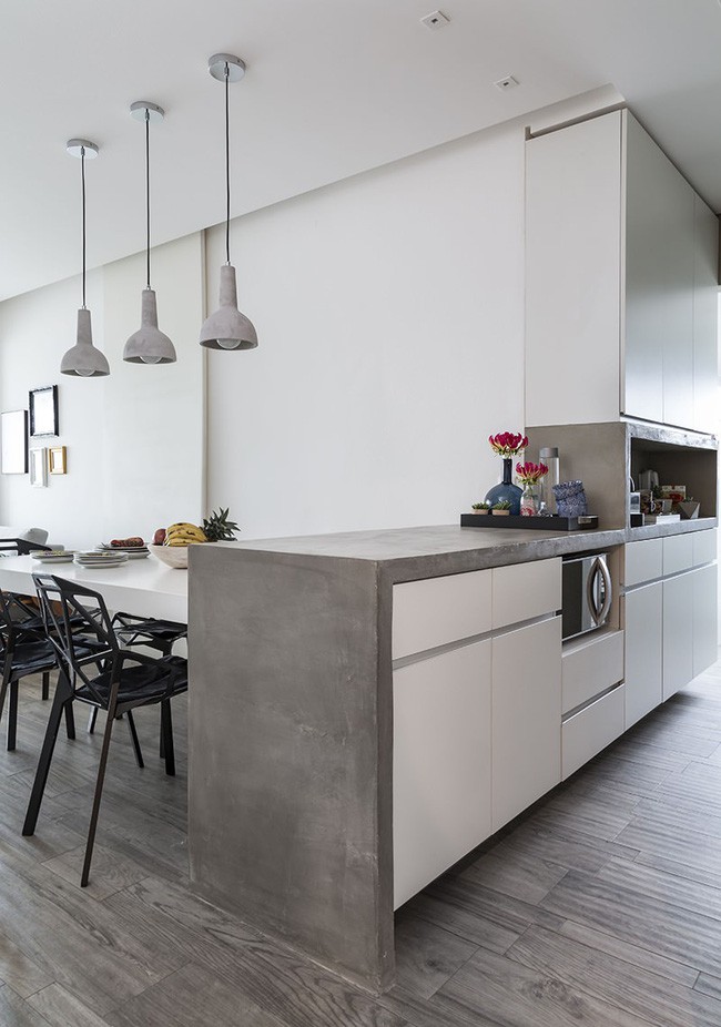 Bàn bar kiêm tủ bếp với tác dụng chia không gian bếp và ăn rõ ràng.