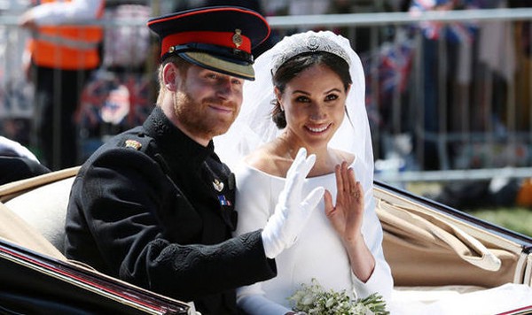 Hoàng tử Harry và vợ Meghan Markle trong ngày cưới. Ảnh: PA.
