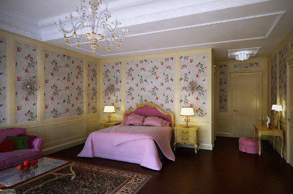 Một kiểu phòng ngủ tân cổ điển khác có điểm nhấn nổi bật nằm ở màu hồng nhạt của thành giường, chăn đệm và ghế sofa.