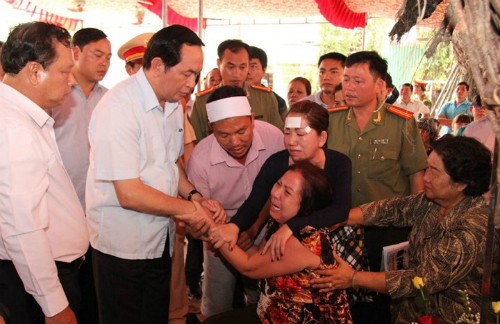 Tháng 7/2015, ông Trần Đại Quang đến hiện trường vụ thảm án ở Bình Phước. Ảnh: Bộ Công an