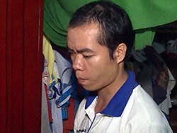 Lê Văn Côi lúc bị bắt tại nhà. Ảnh: Vĩnh Nam