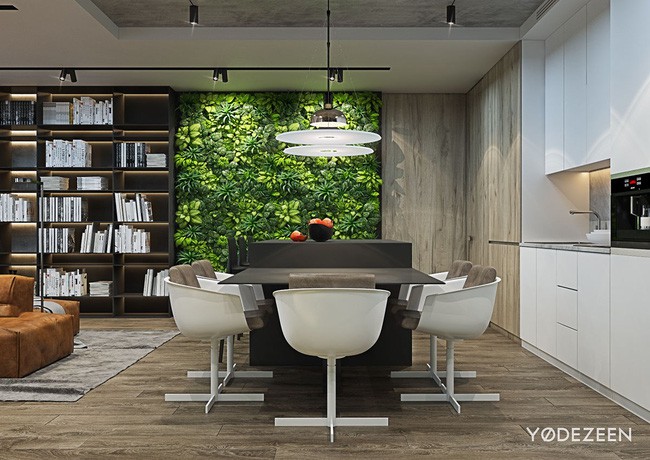Một bức tường bằng cây xanh bao phủ toàn bộ không gian phòng ăn giúp không gian trở nên tươi mát.