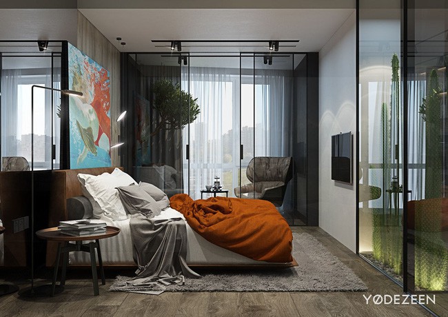 Tiếp liền không gian qua bức tường xương rồng là phòng ngủ với gam màu cam nồng kết hợp với thảm trải sàn màu xám theo phong cách nhiệt đới.