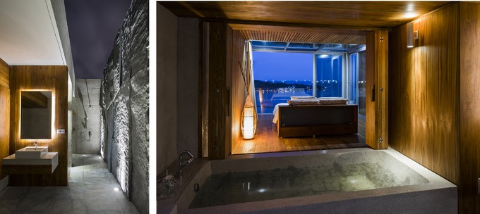 Đồ nội thất chủ yếu dùng gỗ đánh veneer, mang lại cảm giác ấm cúng và sang trọng, trái ngược với các khối đá thô mộc ở phòng tắm.