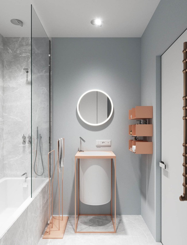 Phòng tắm là một thiết kế tối giản với chất liệu đồng làm chủ đạo. Vì có diện tích khá nhỏ nên mẫu nội thất này giúp không gian trông tinh tế và nhẹ nhàng hơn.