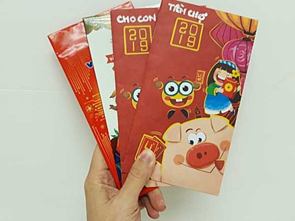 Trước khi khởi động kế hoạch chia tiền tiêu dùng thành 4 phong bì, chị Quỳnh Anh đã cho vào mỗi phong bì một ít tiền để có động lực. Ảnh: Quỳnh Anh.