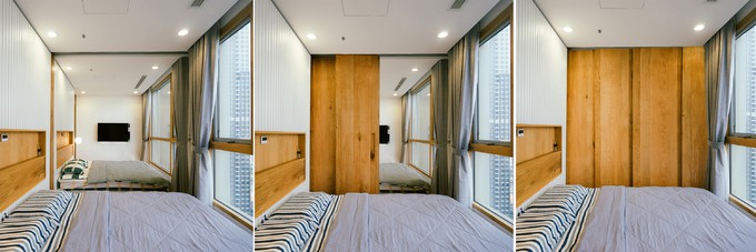 Bức tường cũ ngăn hai phòng ngủ được phá bỏ. Thay vào đó là hệ thống vách ngăn linh hoạt, giúp không gian có thể thu nhỏ hay mở rộng vào mỗi dịp khác nhau, theo nhu cầu của người sử dụng.