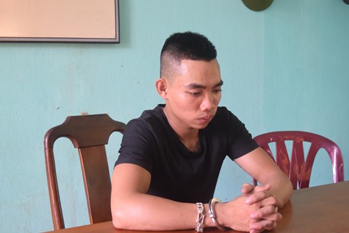 Hưng tại cơ quan điều tra. Ảnh: Trần Hồng