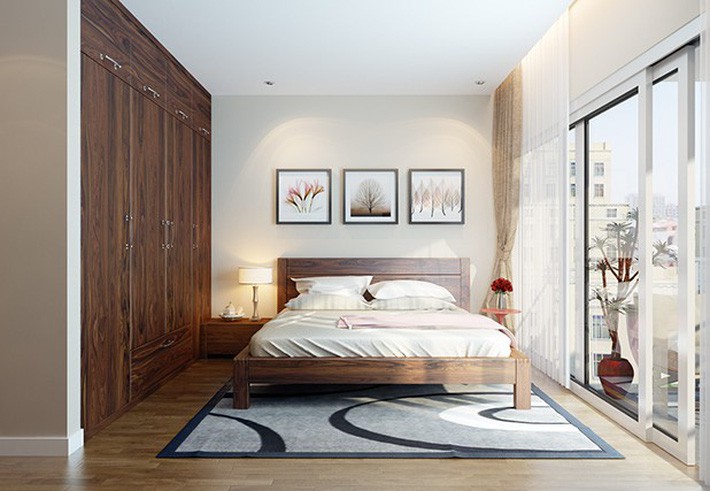 
Phòng ngủ hiện đại với tông màu gỗ và trắng, tràn ngập ánh sáng tự nhiên.
