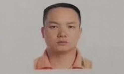 Tang Xiaodong trong lệnh treo thưởng của cảnh sát An Khang. Ảnh: SCMP.
