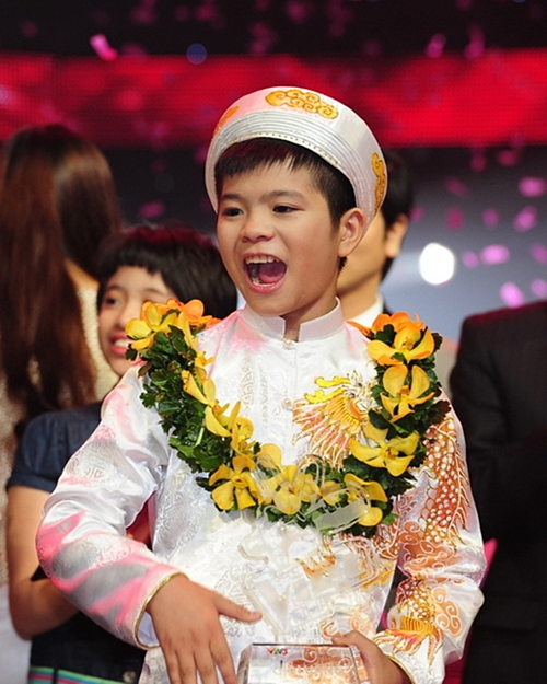 Quang Anh đăng quang Giọng hát Việt nhí năm 2013.