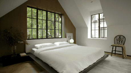 
Phòng ngủ với ô cửa sổ rộng.
