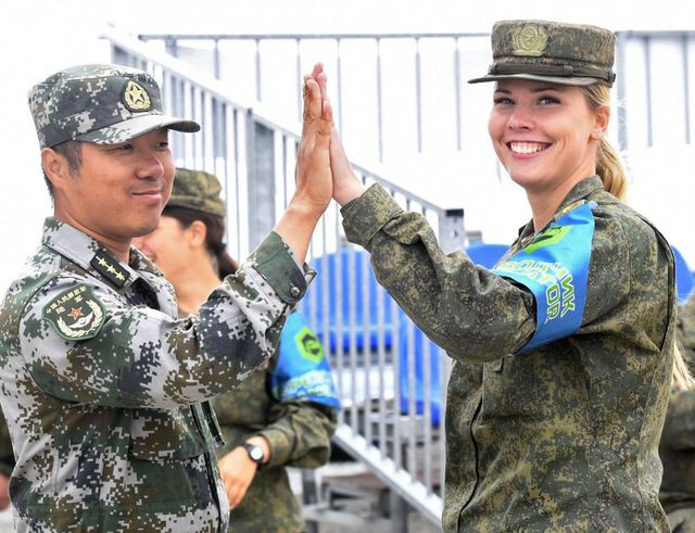 Vẻ đẹp ngọt ngào của dàn nữ quân nhân tại giải đua xe tăng hàng đầu thế giới - Ảnh 7.
