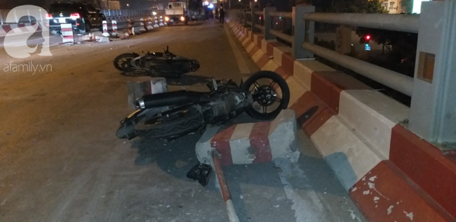 Xe bồn nổ lốp lao vào dải phân cách trên cầu Thanh Trì khiến 4 người bị thương - Ảnh 11. Xe bồn nổ lốp lao vào dải phân cách trên cầu Thanh Trì khiến 4 người bị thương - Ảnh 11.