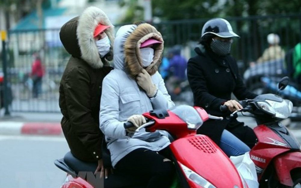 Thời tiết ngày 12/1: Người dân Hà Nội chịu rét đậm rét hại đi sắm Tết - Ảnh 1. Thời tiết ngày 12/1: Người dân Hà Nội chịu rét đậm rét hại đi sắm Tết - Ảnh 1.