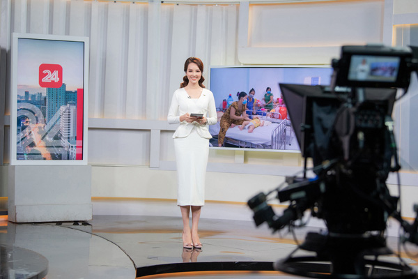 Á hậu Thụy Vân lên sóng bản tin Chuyển động 24h đập tan tin đồn nghỉ việc ở VTV - Ảnh 9.