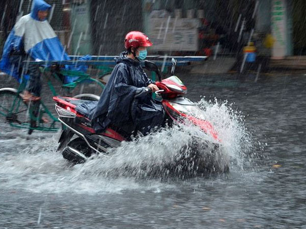 Không khí lạnh tràn về, miền Bắc mưa rào và dông - Ảnh 1.