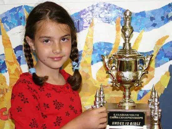 Chân dung nữ kỳ thủ nổi tiếng xinh đẹp, vô địch lần đầu năm 8 tuổi - Ảnh 4.