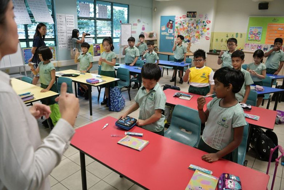 Học sinh Singapore, Thái Lan đi học không cần đeo khẩu trang đến trường - Ảnh 1.