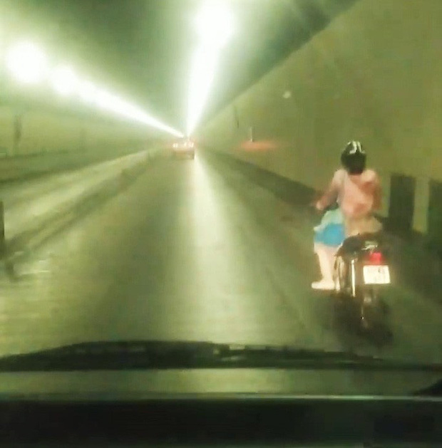 Xác minh danh tính nữ tài xế xe máy vượt biển cấm xuyên hầm Hải Vân - Ảnh 1.
