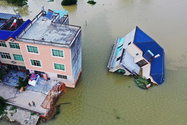 Lũ Trung Quốc: Mực nước 33 con sông chạm mốc kỉ lục, 141 người chết và mất tích - Ảnh 5.