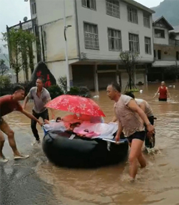 Hình ảnh tang thương của trận mưa lũ lớn tại Trung Quốc khiến 121 người chết, thiệt hại hàng trăm nghìn tỷ đồng - Ảnh 5.