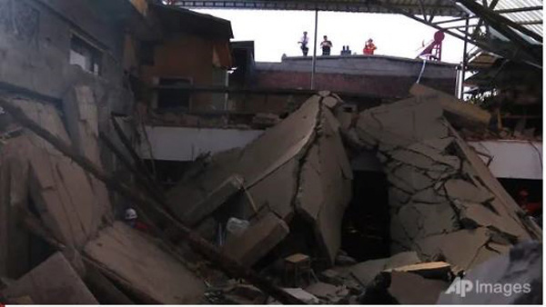 Cận cảnh hiện trường vụ sập nhà hàng ở Trung Quốc khiến ít nhất 29 người chết - Ảnh 2.